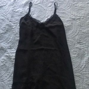 Black lace slip dress with slit